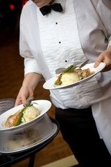 Wedding food being served by a waiter