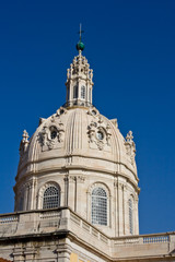 Fototapeta na wymiar Lisbon church tower over deep blue sky