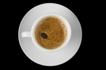 Cup of coffee on black