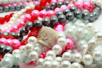 Colored beads in a haos on white