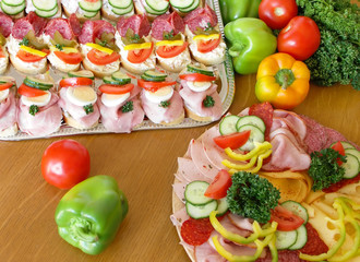 Cold food - salami and fresh vegetables served on plate