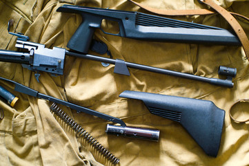 disassembled rifle