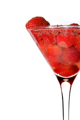 Strawberry in martini glass with champagne