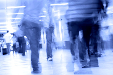 motion blurred of people walking in subway