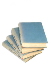 Row of old books isolated on white background