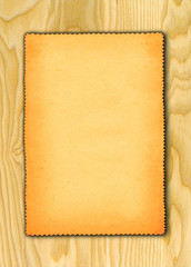 paper against wooden background