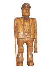 A Wooden Sculpture of a British Coal Miner.