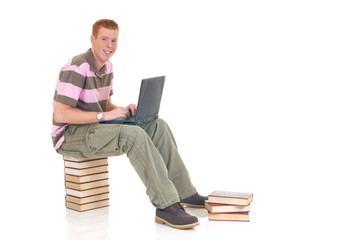 Fototapeta na wymiar Teen student working on laptop