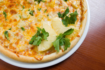 Tasty Italian pizza with pineapple