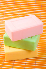 Soap on the bamboo table-cloth