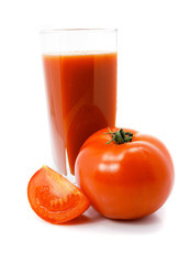 fresh tomato fruits with juice in glass