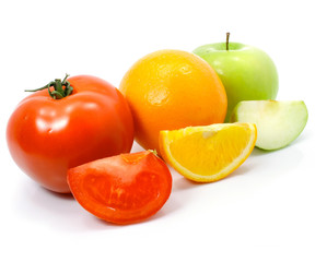 apple orange and tomato fruits with cuts isolated