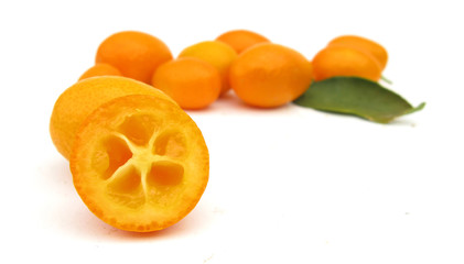 Cumquat or kumquat cross section with leaf