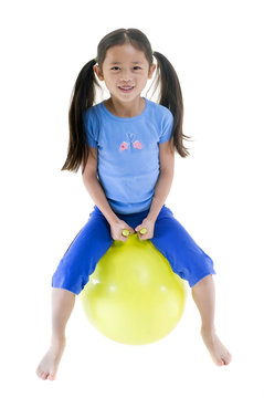 Girl On Bouncing Ball