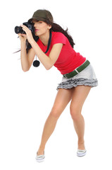 Young sexy girl holding a photo camera.