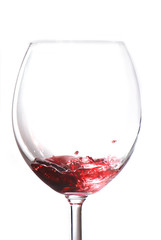Splashing wine isolated on white background