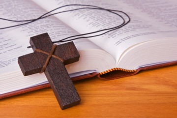 Open bible with cross