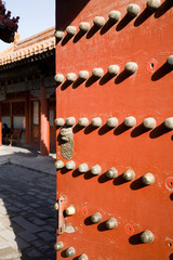 Ancient red Temple door