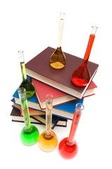Books and tubes isolated on the white