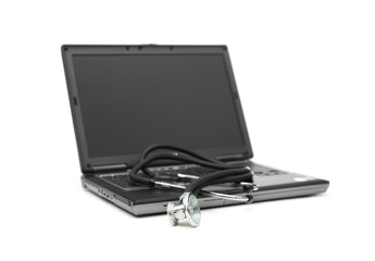 Stethoscope and laptop illustrating concept of digital security