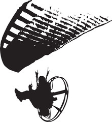 the silhouette of man and paraglider