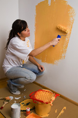 Woman colours her first flat