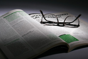 inside the magazine with glasses