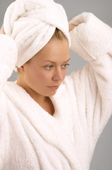 Obraz premium The girl in a dressing gown