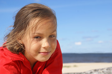 Preteen girl on a beach