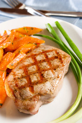 Grilled pork chop with carrot salad