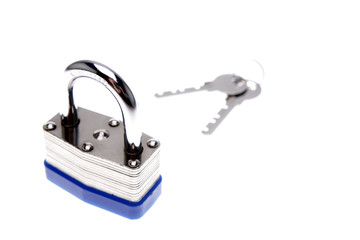 Padlock and keys isolated over white