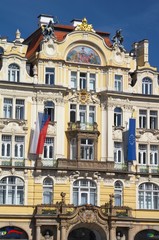 Fototapeta na wymiar ornate building with flags