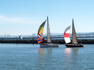 Two Sailboats under Spinnakers running into port