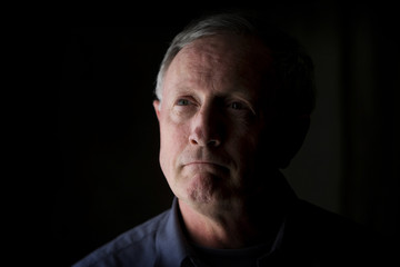 Fototapeta premium Old Man reflecting on the past