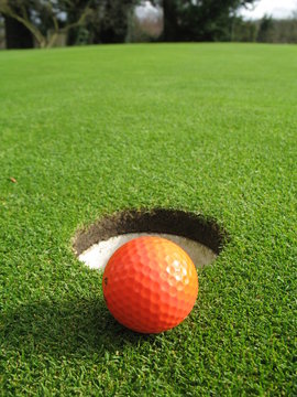 orange golf ball