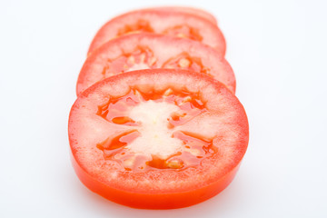 red tomatoes on white background