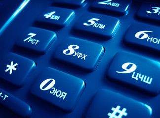 The blue phone pannel with buttons and cyrillic symbols, numbers