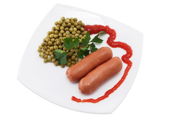 Two sausages with canned green peas