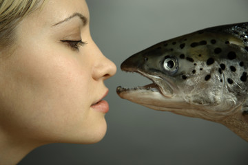 fashionable girl with big fish