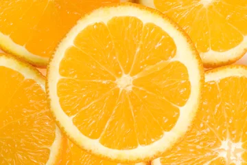 Selbstklebende Fototapeten Hintergrund aus den geschnittenen Orangen © Dmitriy Melnikov
