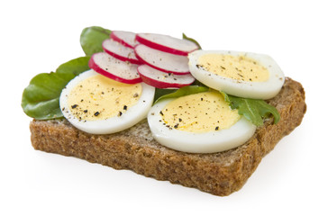 Whole wheat bread egg sandwich isolated on white