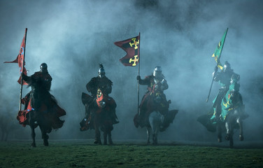 mediaeval knights on horseback - obrazy, fototapety, plakaty