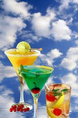 Summer of alcoholic recreational drink on background with sky