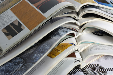 colourful glossy magazines the opened pages