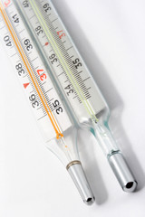Two vertical thermometers