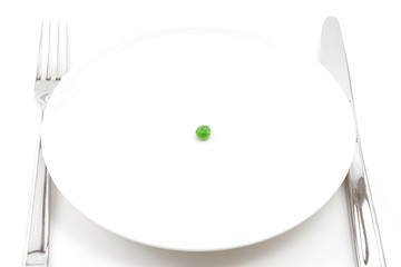 single pea on a plate