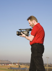 Videographer shooting footage
