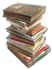 A stack of old vintage and modern books