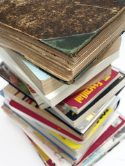 A stack of old vintage and modern books