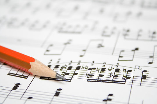 modern musical notes and pencil background